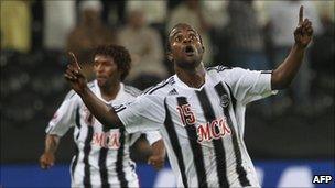 TP Mazembe players celebrate after scoring a goal