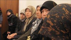 Wives and mothers of the men attend a hearing in Almaty, Kazakhstan