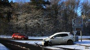 A car left abandoned in the snow on Parkway near Ironbridge, Telford.