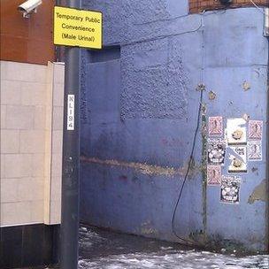 Sign for urinal