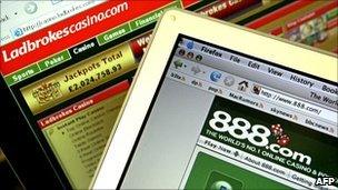 Computer screens showing Ladbrokes and 888's websites