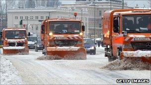 Snow clearing machines clear a street in Berlin, 20 December 2010