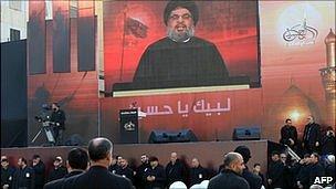 Hassan Nasrallah on a big screen in recent Ashura celebrations
