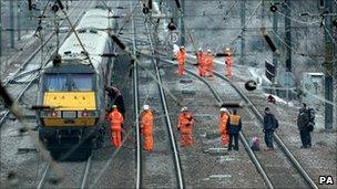 Passengers led off a train outside Huntingdon