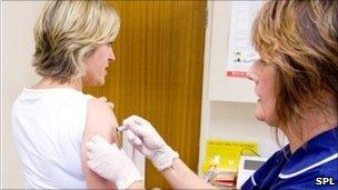 woman having flu jab