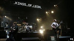 Kings of Leon perform live on stage
