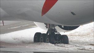 The plane's wheels stuck in snow, picture by Gordon Stretch