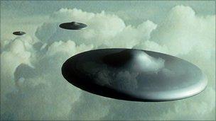 Computer illustration of flying saucers