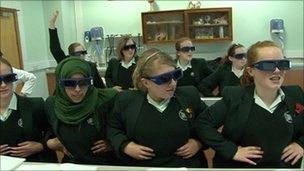 Girls in a classroom having a lesson in 3D