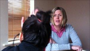 Charity worker with girl