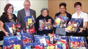 Prison staff with Christmas hampers