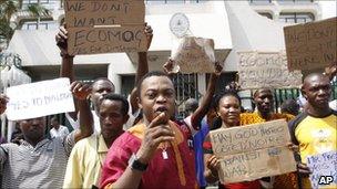 People protesting outside the Nigerian embassy in Abidjan against an intervention force