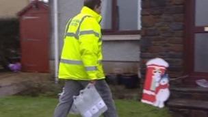 Bottled water being delivered in Carmarthenshire