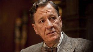 Geoffrey Rush as Lionel Logue in The King's Speech