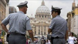 File picture of Italian financial police officers in front of St Peter's Basilica in Rome