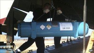 A container of highly enriched uranium is loaded on to a plane in Sevastopol, Ukraine (undated photo)