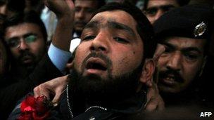 Arrested Pakistani bodyguard Malik Mumtaz Hussain Qadri