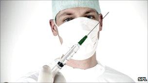 Anaesthetist with needle