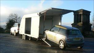 Electric mini being loaded for journey home