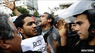 Protesters confront police in Tunis. 19 Jan 2011