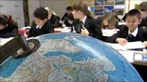 Children in class with globe