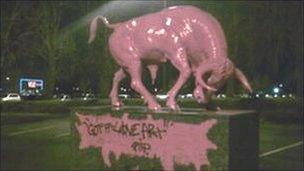The ox statue covered in pink paint