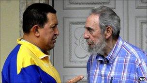 Hugo Chavez and Cuba's former president Fidel Castro in file photo from November 2010