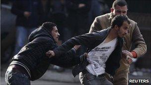 Police arrest protester in Cairo