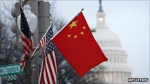 US and Chinese flags fly in Washington on 18 January 2011