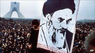 A poster of Ayatollah Khomeini at an anti-Shah demonstration in Tehran in December 1978