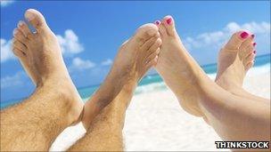 Feet on a beach