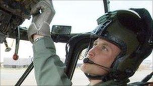 Prince William in the seat of a Sea King helicopter at RAF Valley, Anglesey