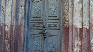 Closed doors in the Shahi Mohallah area of Lahore