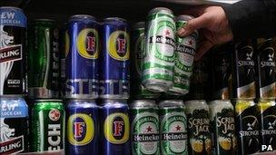 Cans of lager in a shop - generic
