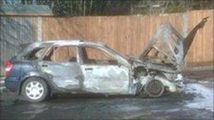 Car after explosion in Vigo, Kent