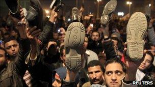 Protesters in Tahrir Square listening to Mr Mubarak's speech - 10 February 2011