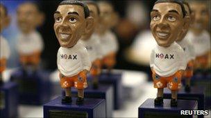 President Obama "hoax" figurines