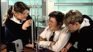 Pupils observe electrolysis of water during science lesson