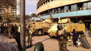 Egyptian troops outside the state TV HQ