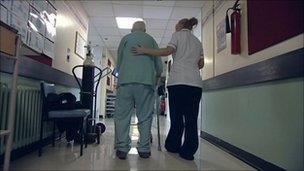 Elderly man with nurse (generic image)