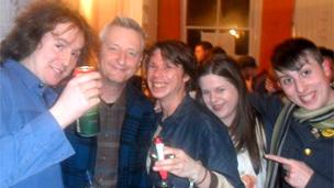 Billy Bragg with some students