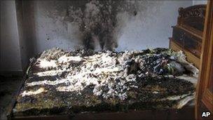 The charred bed of Vietnamese journalist Le Hoang Hung, at his home in southern Long An province, Vietnam, 19 Jan '11
