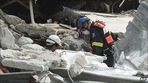 Specialist teams sift through the destroyed CTV building in Christchurch on Thursday 24 February