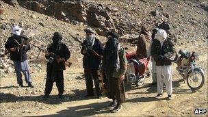 Taliban fighters during a patrol in Ghazni province on 23 January 2010