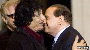 Muammar Gaddafi and Silvio Berlusconi meet in Rome, file image, November 16, 2009