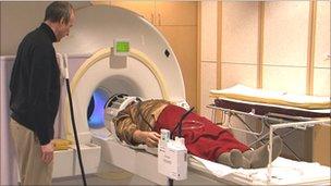 Zoran Josipovic prepares a Buddhist monk for a brain scan in an fMRI machine