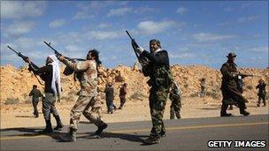 Libyan rebels firing