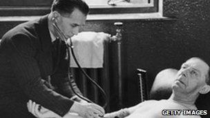 An archive image of a doctor and patient