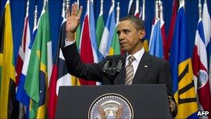 US President Barack Obama waving after speaking in Santiago