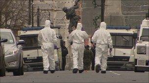 Forensic experts at bomb scene